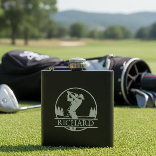 Black flask with 'Richard' and a logo on a wooden surface